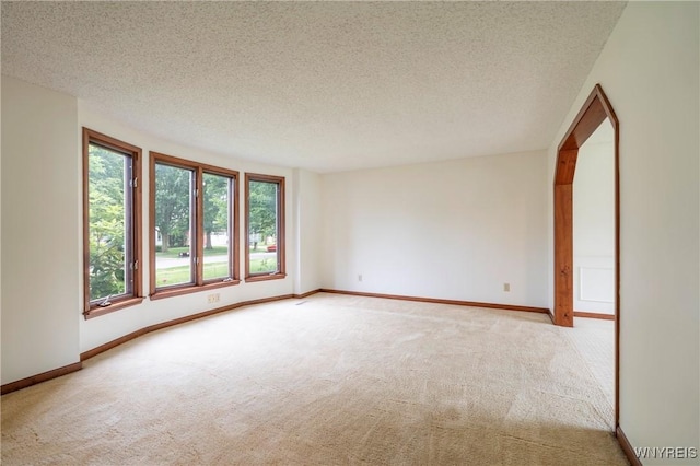 64 Bywater Dr, Amherst, NY 14068 - spare room featuring light colored carpet and a textured ceiling