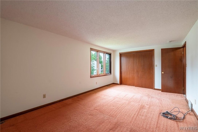 64 Bywater Dr, Amherst, NY 14068 - unfurnished bedroom with carpet floors, a textured ceiling, and a closet