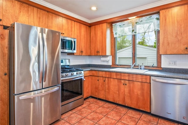 199 Brett Rd, Irondequoit, NY 14609 - kitchen with appliances with stainless steel finishes, dark countertops, crown molding, brown cabinets, and recessed lighting