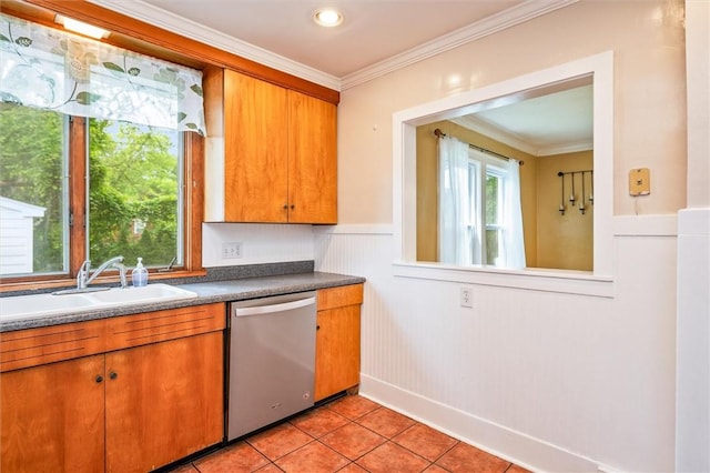 199 Brett Rd, Irondequoit, NY 14609 - kitchen featuring dishwasher, ornamental molding, brown cabinetry, light tile patterned floors, and a wainscoted wall