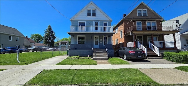 129 Albert Ave, Buffalo, NY 14207 - view of front of property with a porch, a balcony, and stairway