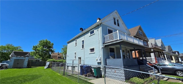 129 Albert Ave, Buffalo, NY 14207 - view of side of property featuring a balcony, a storage shed, a chimney, and covered porch