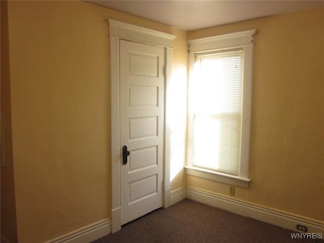129 Albert Ave, Buffalo, NY 14207 - spare room with dark colored carpet and baseboards
