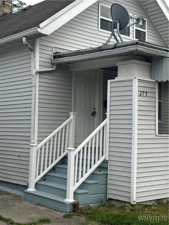275 Olympic Ave, Buffalo, NY 14215 - doorway to property featuring a chimney