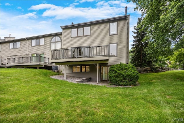 4797 Huntwood, Manlius, NY 13104 - back of house with a lawn and a deck