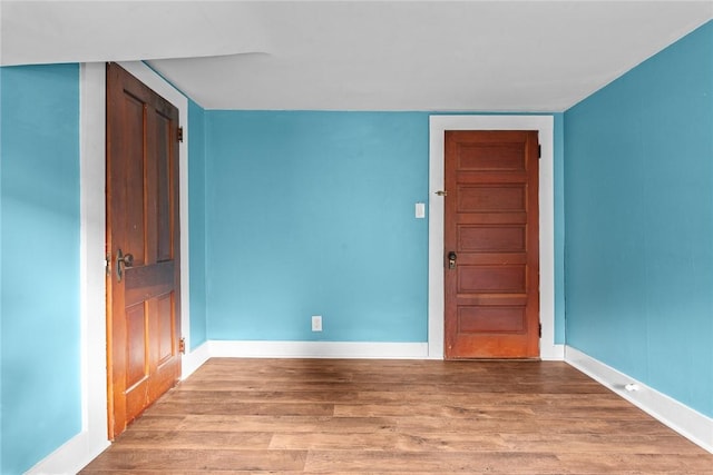 9 Orchard St, Delhi, NY 13753 - unfurnished room featuring wood finished floors and baseboards