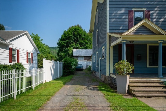 9 Orchard St, Delhi, NY 13753 - view of side of property with a porch and driveway
