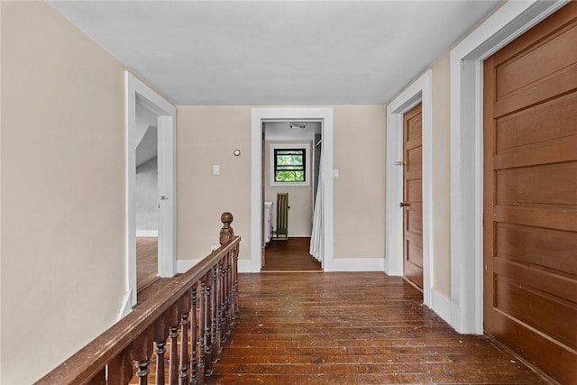 9 Orchard St, Delhi, NY 13753 - corridor featuring dark wood-type flooring and baseboards