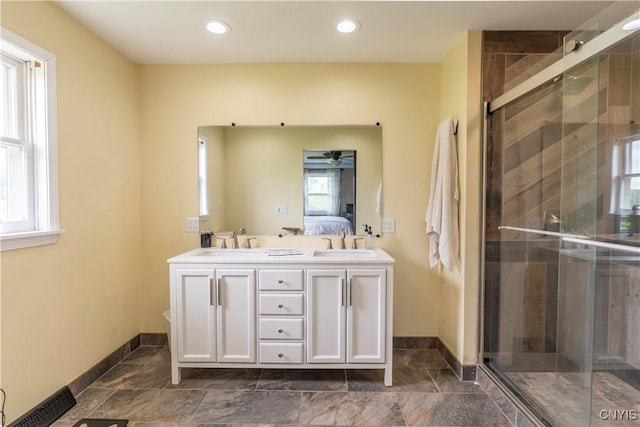 4045 E Milestrip Rd, Fenner, NY 13032 - ensuite bathroom with double vanity, a shower stall, and recessed lighting