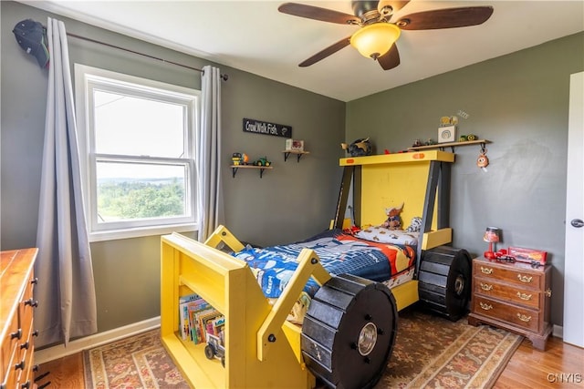 4045 E Milestrip Rd, Fenner, NY 13032 - bedroom featuring wood finished floors and a ceiling fan