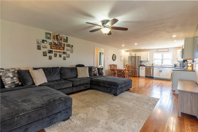 4045 E Milestrip Rd, Fenner, NY 13032 - living area with a ceiling fan, light wood-style flooring, and recessed lighting