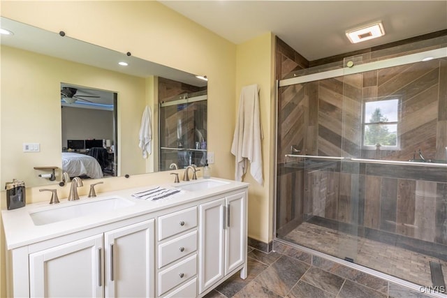 4045 E Milestrip Rd, Fenner, NY 13032 - full bathroom featuring a ceiling fan, double vanity, a stall shower, ensuite bathroom, and recessed lighting