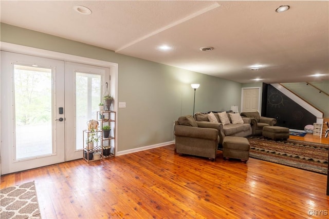 4045 E Milestrip Rd, Fenner, NY 13032 - living area featuring hardwood / wood-style floors, french doors, stairs, and recessed lighting