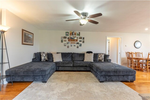 4045 E Milestrip Rd, Fenner, NY 13032 - living room featuring ceiling fan and wood finished floors