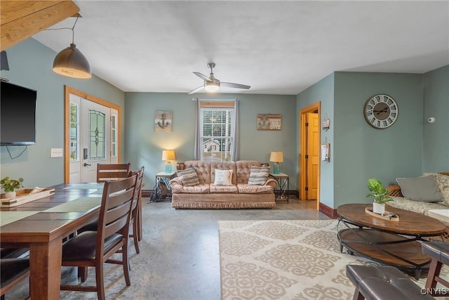 2012 Pleasant Ave, Vienna, NY 13308 - living room featuring concrete flooring and a ceiling fan