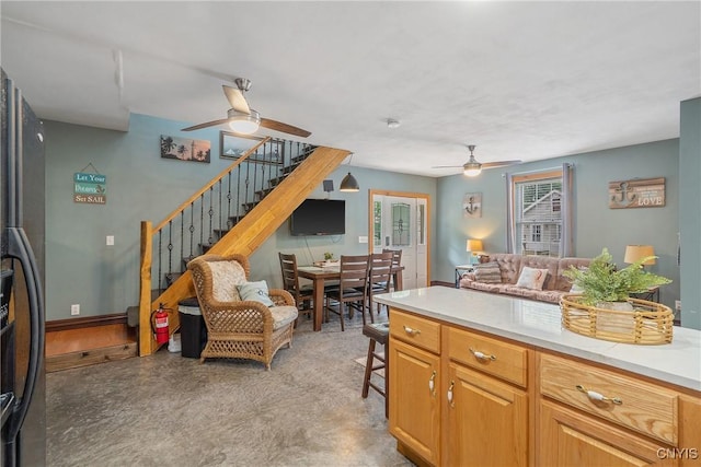 2012 Pleasant Ave, Vienna, NY 13308 - kitchen with a ceiling fan, light countertops, and open floor plan