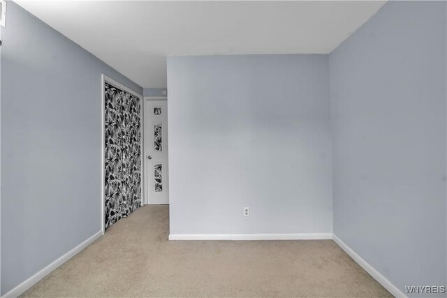 351 Charlesgate Cir, Amherst, NY 14051 - carpeted empty room with baseboards