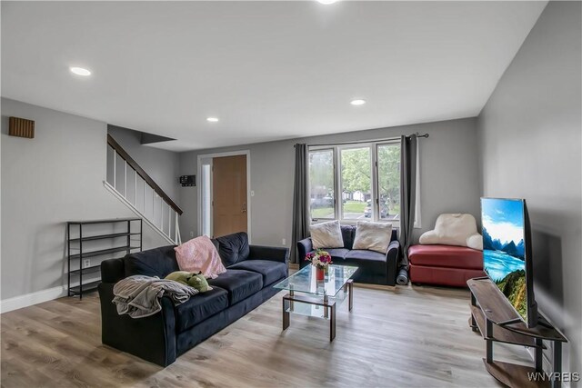 351 Charlesgate Cir, Amherst, NY 14051 - living room featuring stairway, wood finished floors, and recessed lighting