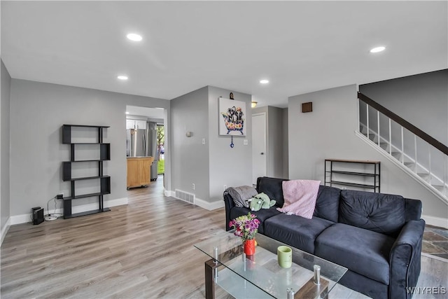 351 Charlesgate Cir, Amherst, NY 14051 - living area featuring stairway, recessed lighting, and light wood-style flooring