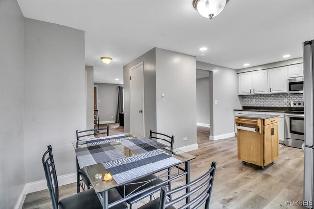 351 Charlesgate Cir, Amherst, NY 14051 - dining area featuring light wood finished floors and recessed lighting