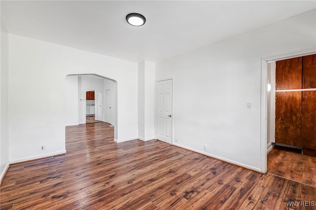 66 Schmarbeck Ave, Buffalo, NY 14212 - empty room featuring wood finished floors and arched walkways