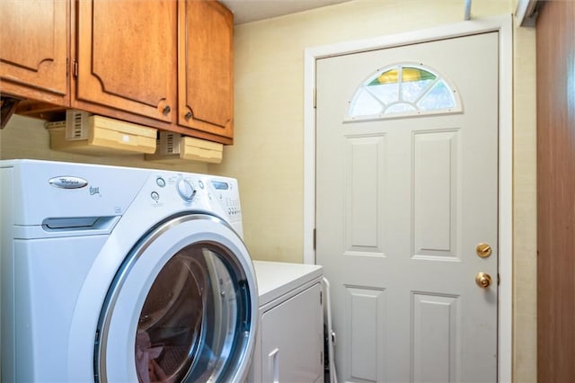 99 Old English Dr, Greece, NY 14616 - laundry room featuring cabinet space and washing machine and clothes dryer