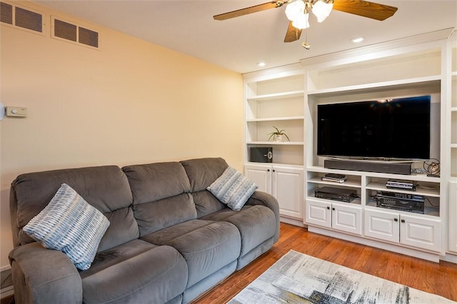 99 Old English Dr, Greece, NY 14616 - living room with ceiling fan and light wood finished floors