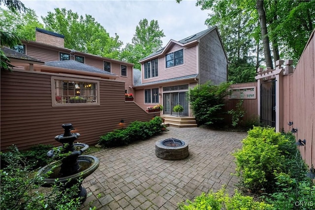 4582 Whetstone Rd, Manlius, NY 13104 - back of property with a patio area and an outdoor fire pit