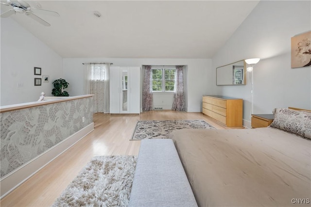 4582 Whetstone Rd, Manlius, NY 13104 - bedroom with vaulted ceiling, wood finished floors, and ceiling fan