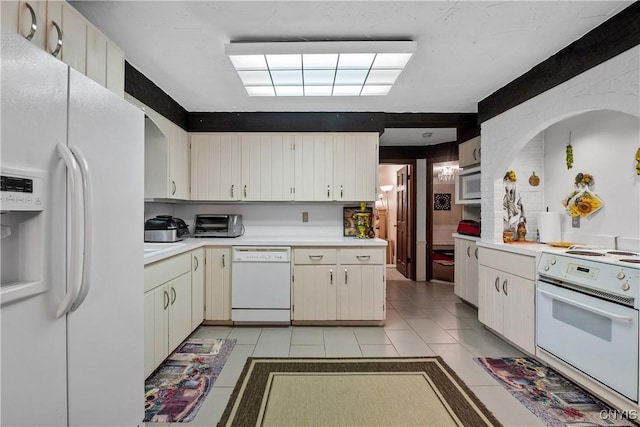 4582 Whetstone Rd, Manlius, NY 13104 - kitchen featuring white appliances, light countertops, and light tile patterned flooring