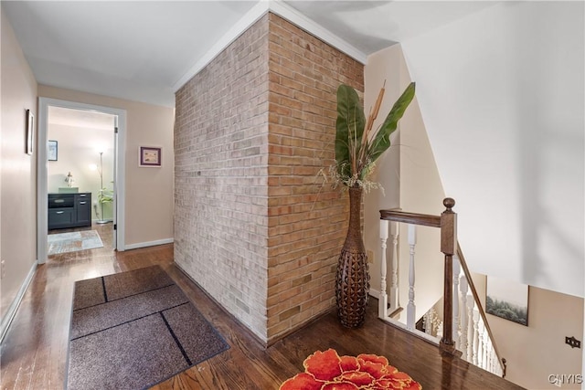 4582 Whetstone Rd, Manlius, NY 13104 - corridor featuring wood finished floors, an upstairs landing, and brick wall