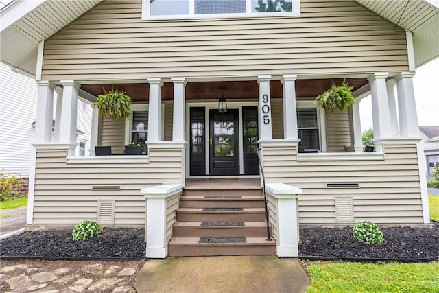 905 W Center St, Ridgeway, NY 14103 - doorway to property featuring a porch