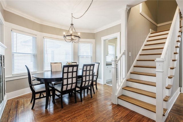 905 W Center St, Ridgeway, NY 14103 - dining area with a chandelier, stairway, dark wood-type flooring, plenty of natural light, and crown molding