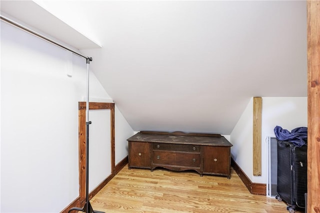 905 W Center St, Ridgeway, NY 14103 - additional living space featuring wood finished floors and vaulted ceiling