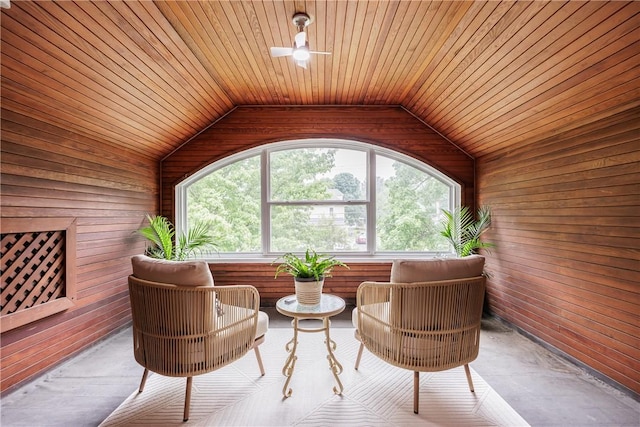 905 W Center St, Ridgeway, NY 14103 - living area with wooden ceiling, wood walls, lofted ceiling, and a ceiling fan