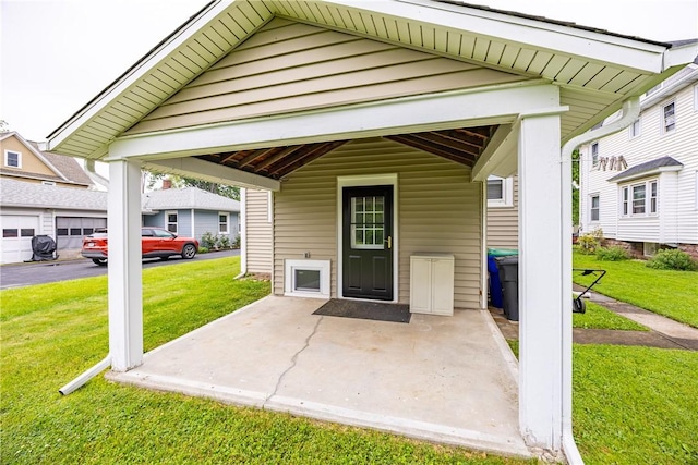 905 W Center St, Ridgeway, NY 14103 - property entrance featuring a lawn and a patio