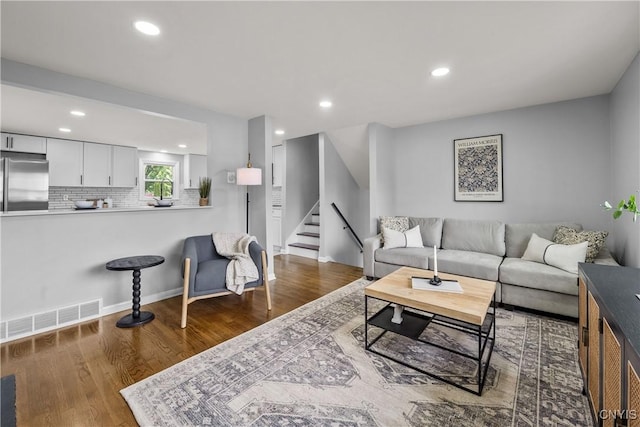 8478 Grandview Dr, Cicero, NY 13039 - living area with stairway, recessed lighting, and wood finished floors