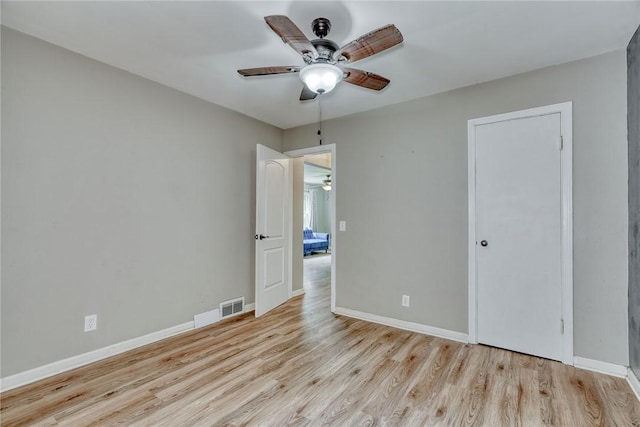 244 Highland Pkwy, Rochester, NY 14620 - unfurnished room featuring a ceiling fan and wood finished floors