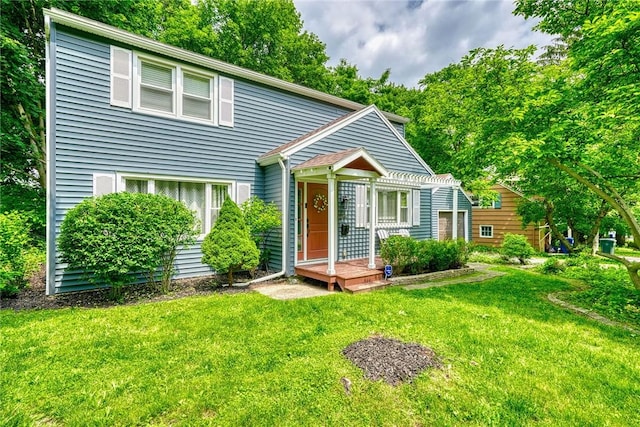 244 Highland Pkwy, Rochester, NY 14620 - view of front of house with a pergola and a front yard