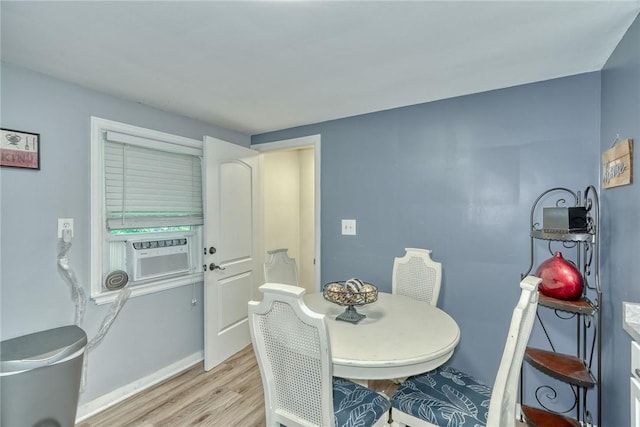 244 Highland Pkwy, Rochester, NY 14620 - dining area featuring light wood-style flooring and cooling unit