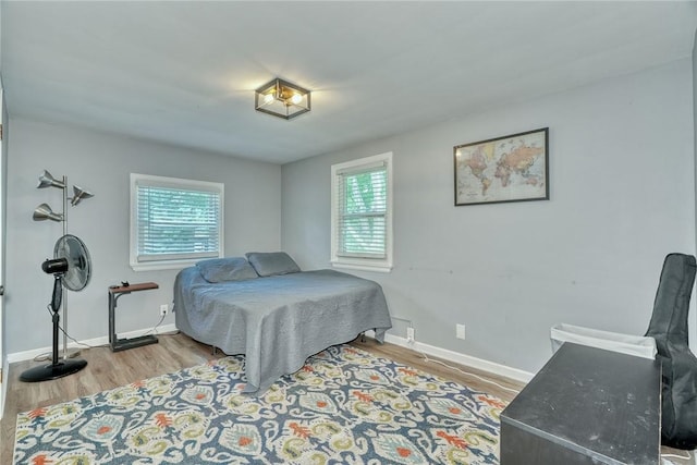 244 Highland Pkwy, Rochester, NY 14620 - bedroom featuring multiple windows and wood finished floors