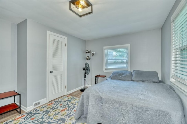 244 Highland Pkwy, Rochester, NY 14620 - bedroom with wood finished floors and baseboards