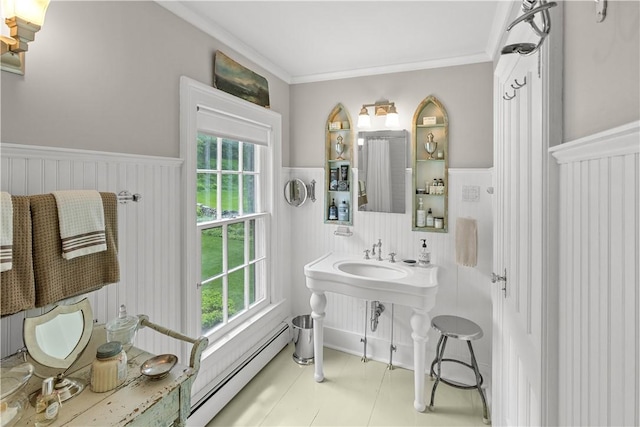 6806 County Highway 14, Meredith, NY 13846 - bathroom featuring a wainscoted wall, a baseboard radiator, and ornamental molding