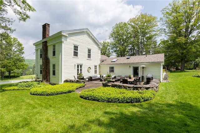 6806 County Highway 14, Meredith, NY 13846 - rear view of house with an outdoor hangout area, a chimney, a yard, and a patio