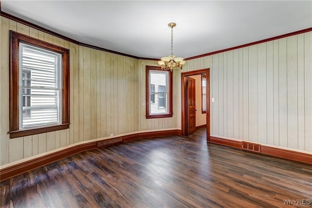 373 Urban St, Buffalo, NY 14211 - empty room featuring a chandelier, wood finished floors, and ornamental molding