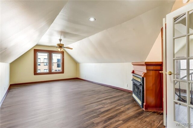373 Urban St, Buffalo, NY 14211 - bonus room featuring dark wood-style floors, lofted ceiling, a fireplace, ceiling fan, and recessed lighting