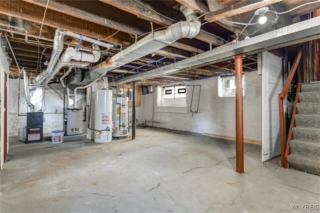 373 Urban St, Buffalo, NY 14211 - below grade area featuring water heater, stairs, and heating unit