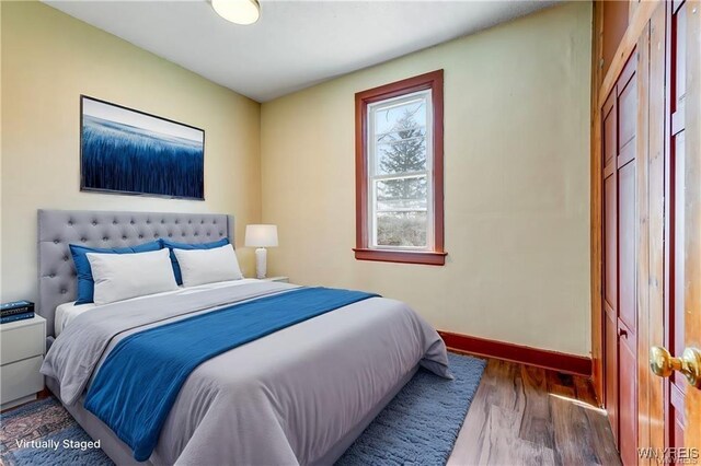 373 Urban St, Buffalo, NY 14211 - bedroom with wood finished floors and baseboards