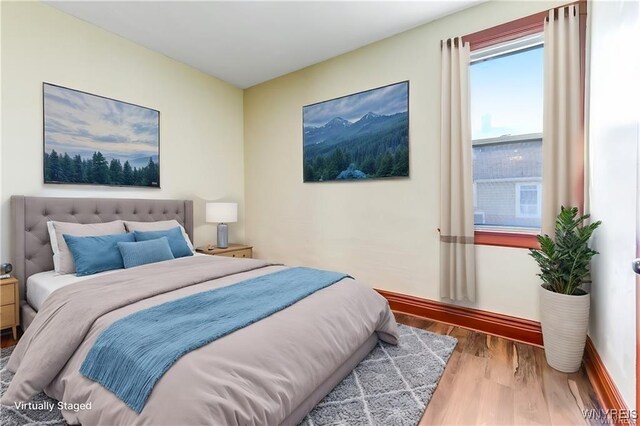 373 Urban St, Buffalo, NY 14211 - bedroom with wood finished floors and baseboards