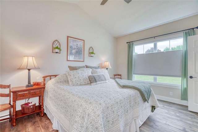 1391 Creeks Edge Dr, Webster, NY 14580 - bedroom with vaulted ceiling, wood finished floors, and a ceiling fan